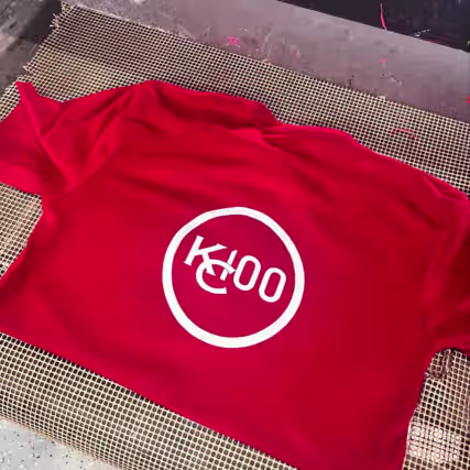 Screen printing press in action